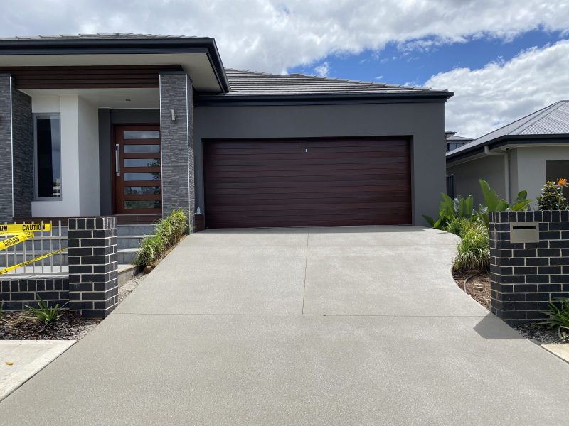 Concrete surface in Denham Court, South West Sydney after spray-on resurfacing in French Grey, with a textured non-slip finish