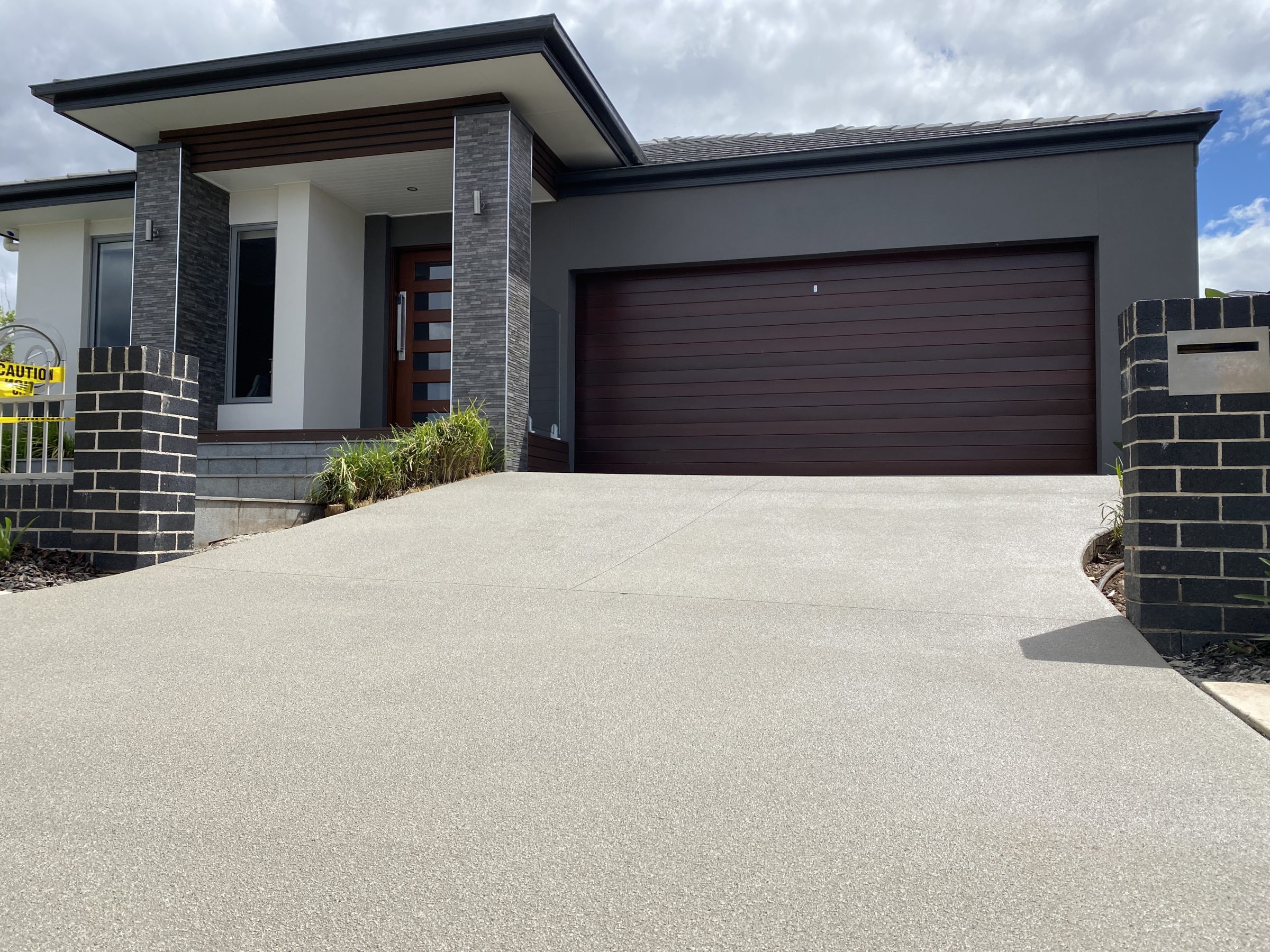 Concrete driveway in Sydney resurfaced by Royal Concrete Resurfacing, with a textured non-slip spray-on finish